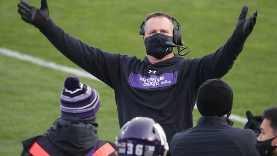 northwestern-pat-fitzgerald-arms-us.jpg