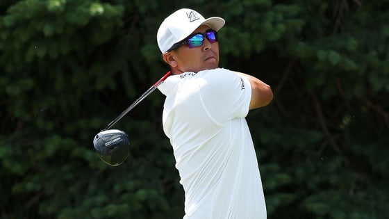 Min Woo Lee takes a swing