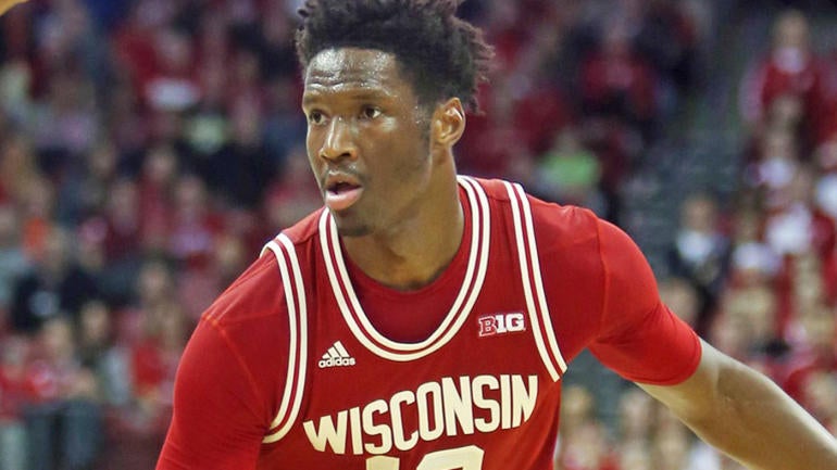 Wisconsin's Nigel Hayes has to buy doughnuts for entire student section