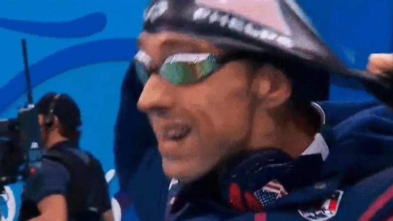LOOK: Not even a ripped cap can stop Michael Phelps from his 21st Olympic gold