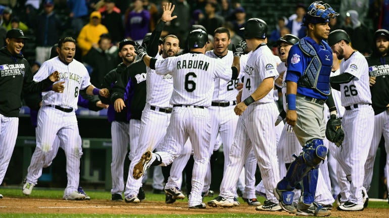 WATCH: Cubs fan throws back Rockies home run at Coors Field