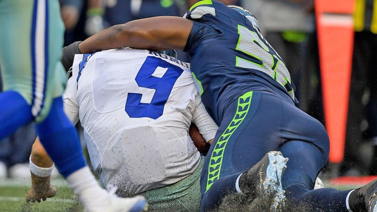 Tony Romo's MRI reveals broken bone in back, could miss 6-10 weeks for Cowboys