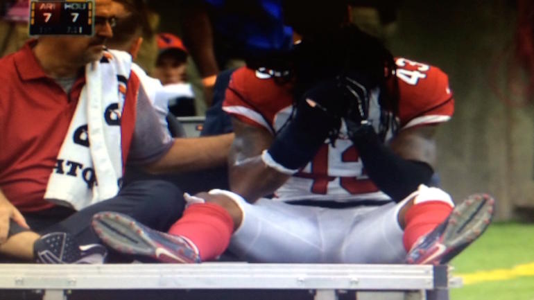Cardinals corner Mike Jenkins carted off with non-contact knee injury