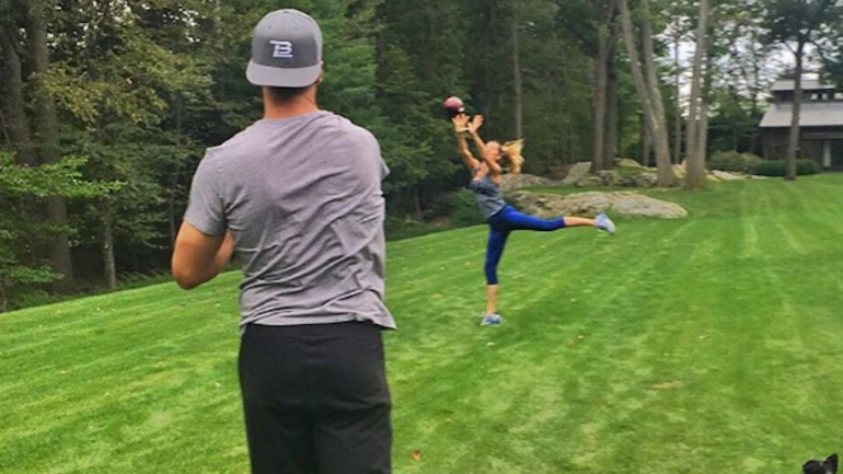 LOOK: Tom Brady stays loose and fresh during suspension by throwing to Gisele
