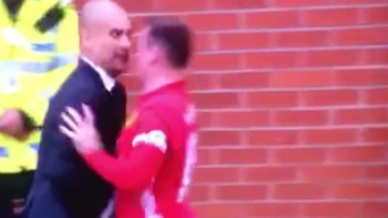 WATCH: Wayne Rooney tries to wrestle ball away from Pep Guardiola