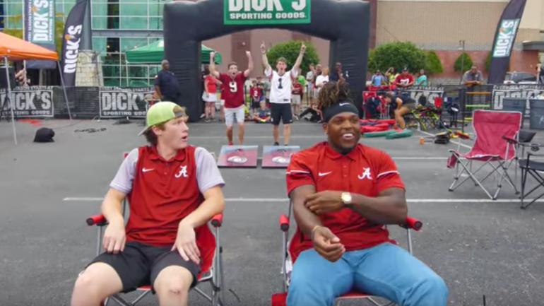 Watch Derrick Henry make absurd trick shots in a sporting goods store