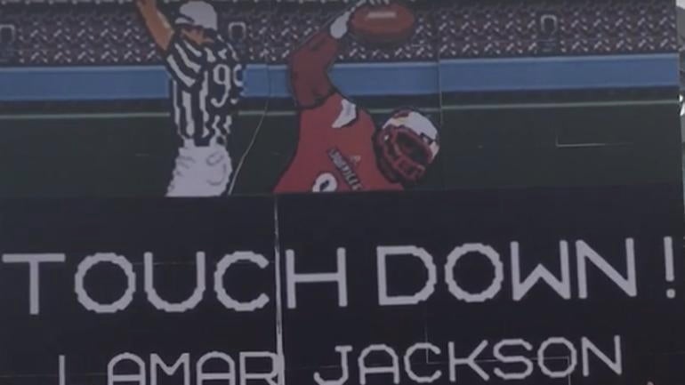 LOOK: Louisville brought an intense kid and awesome Tecmo Bowl sign to 'GameDay'