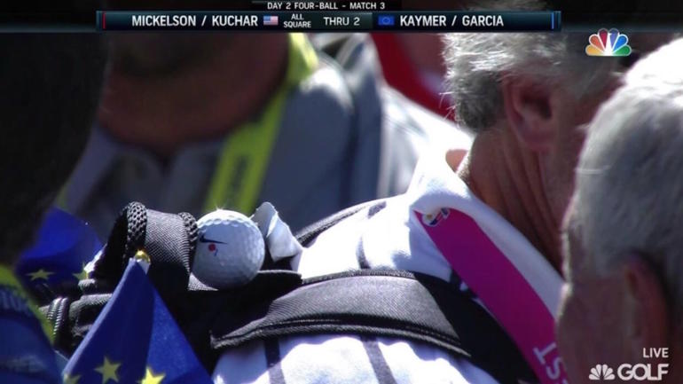 LOOK: Brooks Koepka lands golf ball on backpack being worn by opponent's dad
