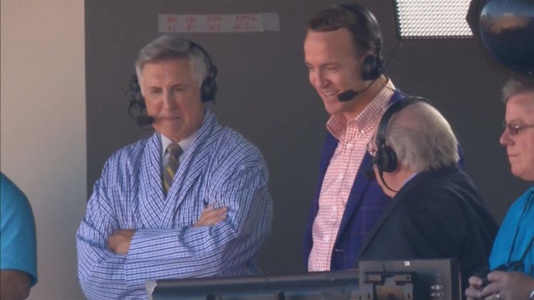 LOOK: Here's Gary Danielson wearing a robe while interviewing Peyton Manning
