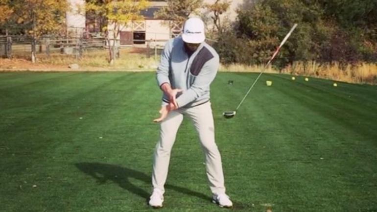 WATCH: Somehow, this golfer picks up his club mid swing on this trick shot