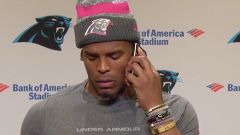 WATCH: Cam Newton answers reporter's phone in the middle of a press conference