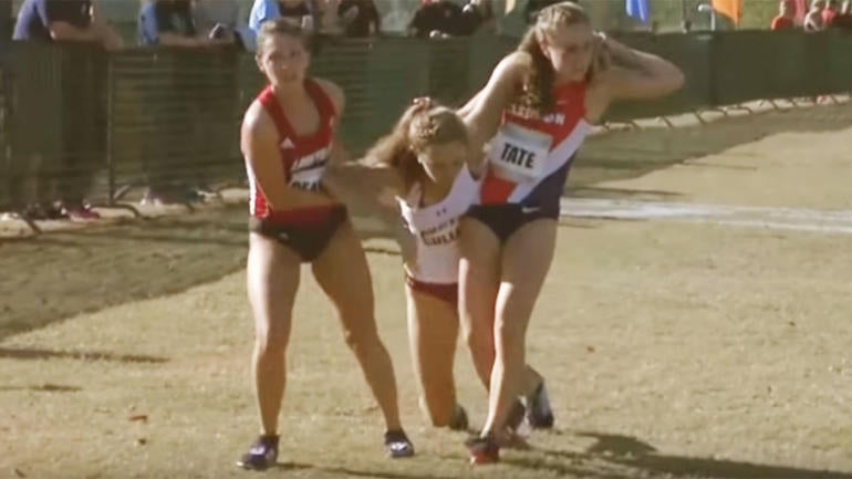 WATCH: Opponents stop to help injured runner during championship race