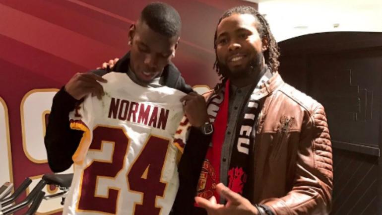 LOOK: Redskins' Josh Norman brings Man. United's Paul Pogba to postgame podium
