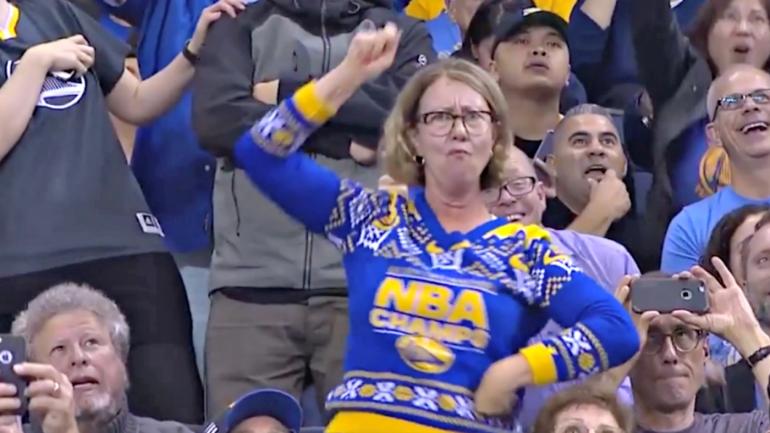 WATCH: This Warriors fan decked out in Christmas gear is a dancing machine