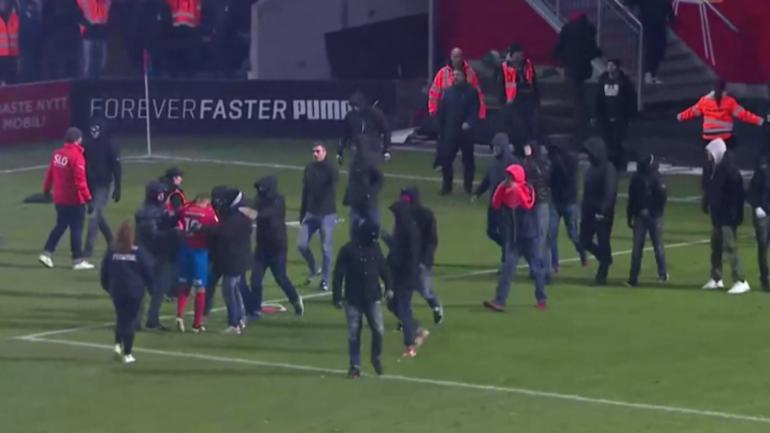 Soccer hooligans storm field after team gets relegated, steal player's jersey