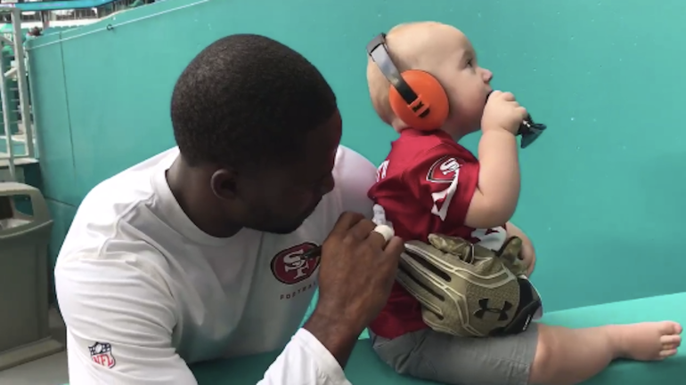 WATCH: Torrey Smith autographs a baby before game vs. Dolphins