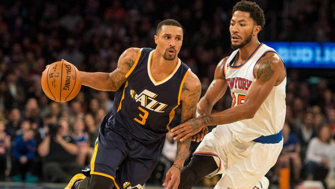 George Hill drives against Derrick Rose