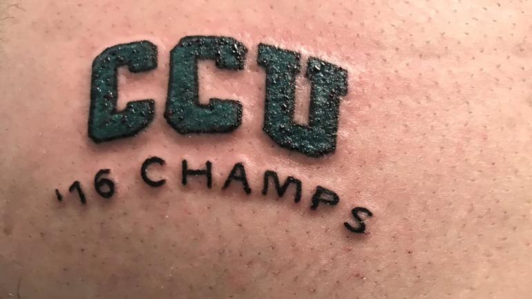 LOOK: Jake Arrieta pays up on College World Series tattoo bet