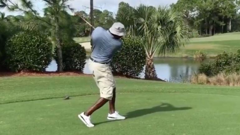WATCH: Michael Jordan's golf swing is nearly as bizarre as Charles Barkley's