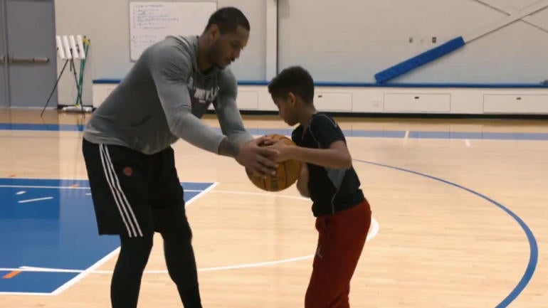 WATCH: Carmelo Anthony teaches his adorable son his signature jab step move