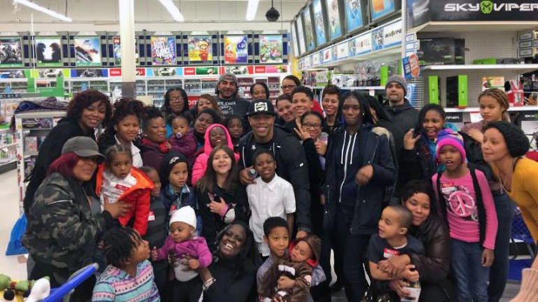 Ray Rice makes Christmas dreams a reality for dozens of Baltimore kids