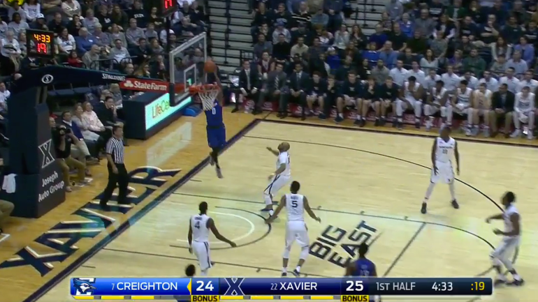 WATCH: Creighton's Marcus Foster nearly bangs his head on rim on alley-oop jam