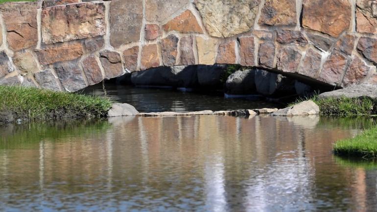 China closes more than 100 courses for improperly using water, land