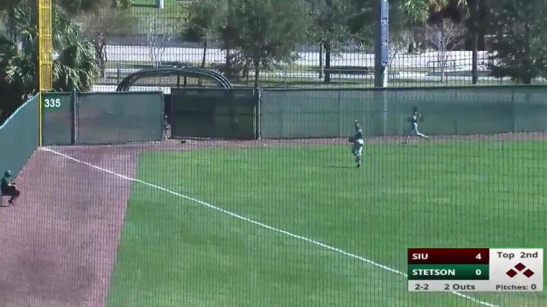 WATCH: Stetson outfielder crashes through fence on inside-the-park grand slam