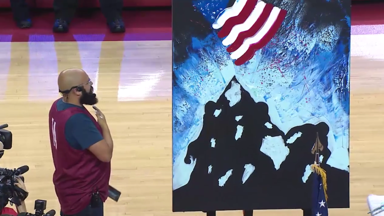 WATCH: National anthem singer paints American masterpiece during performance