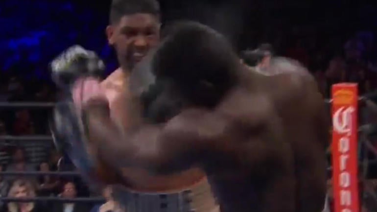 WATCH: Boxer gets knocked clean out of the ring by devastating shot