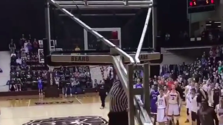 WATCH: Sick windmill dunk from referee sends crowd into frenzy