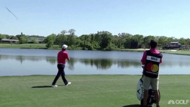 WATCH: Emiliano Grillo nonchalantly tosses club in lake after terrible shot