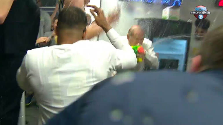 WATCH: Michigan's John Beilein super-soaks his team after upsetting Louisville