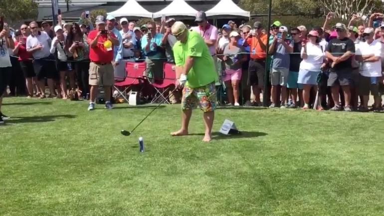 WATCH: John Daly hits driver off a beer can then chugs it while barefoot