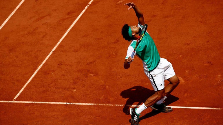 Tsonga upset in first round as host country's struggles continue at French Open