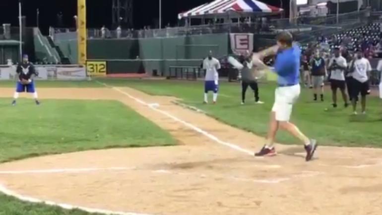 WATCH: Eli Manning proves at softball game he's not going to pull a Tim Tebow