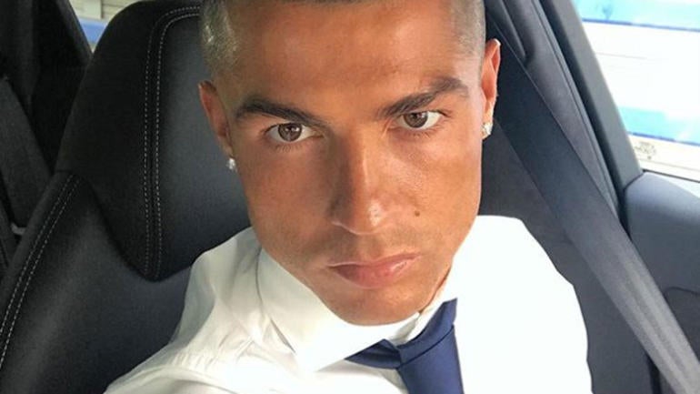 Ronaldo ditches the frosted tips for a new hairstyle after Champions League final win