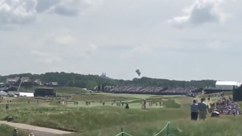 WATCH: Blimp crashes and explodes at U.S. Open, passenger parachutes out