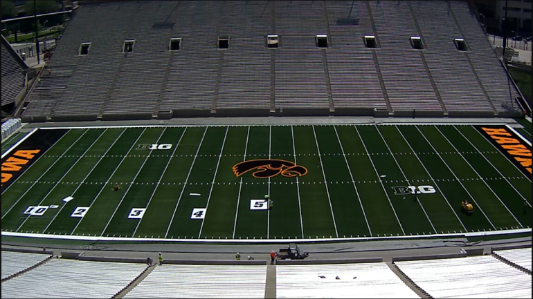 LOOK: Iowa puts logo at midfield of Kinnick Stadium after nearly 40 years without one