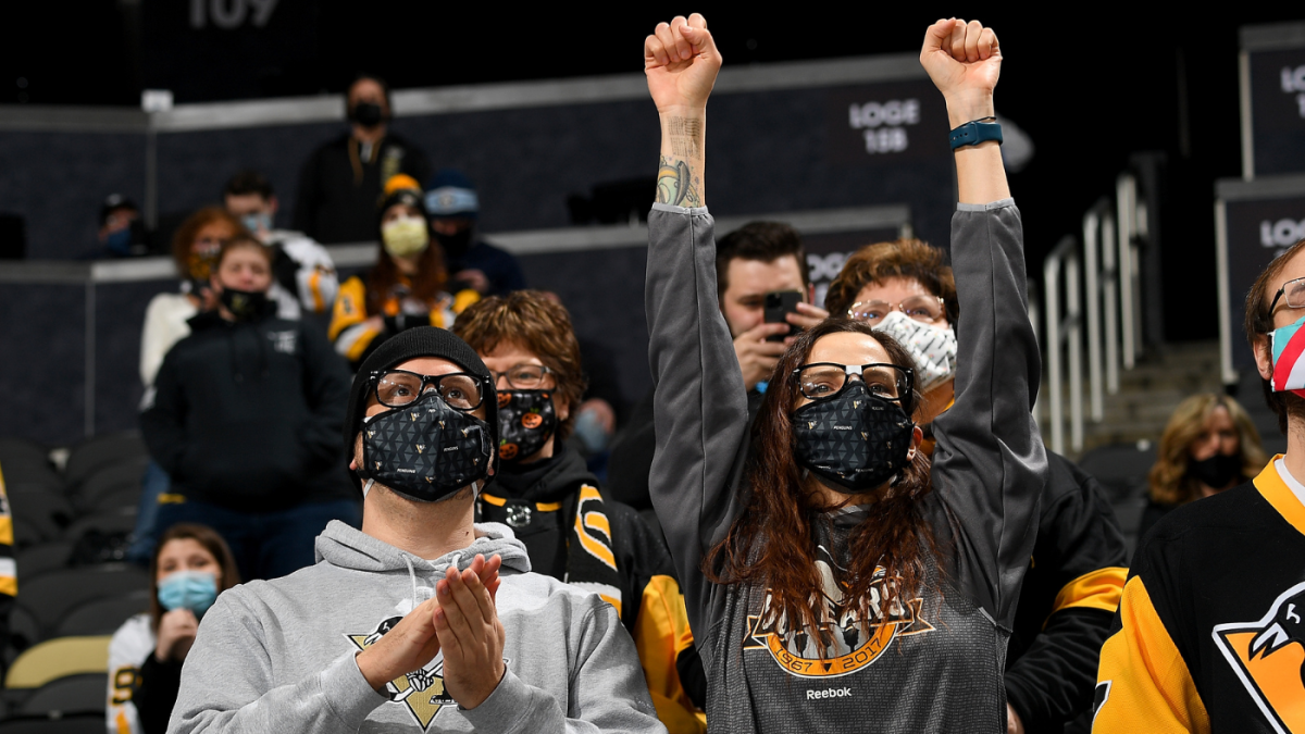Penguins admit they edited masks onto fans for social media post - NewsOpener Penguins admit they edited masks onto fans for social media post