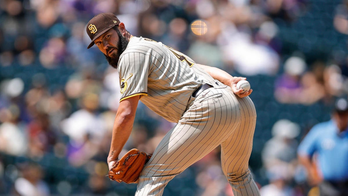 Jake Arrieta allows five runs in Padres debut at Coors Field, exits early with trainer - NewsOpener Jake Arrieta allows five runs in Padres debut at Coors Field, exits early with trainer