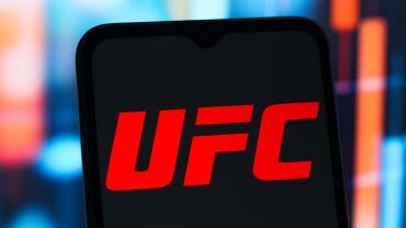 In this photo illustration, the UFC (Ultimate Fighting