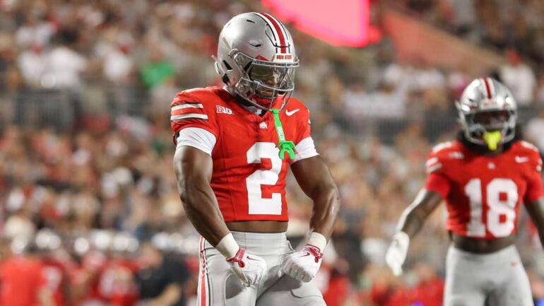 Ohio State DB Caleb Downs celebrates after a big play.