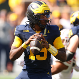 Michigan QB Bryce Underwood drops back to pass in a game vs. Wisconsin