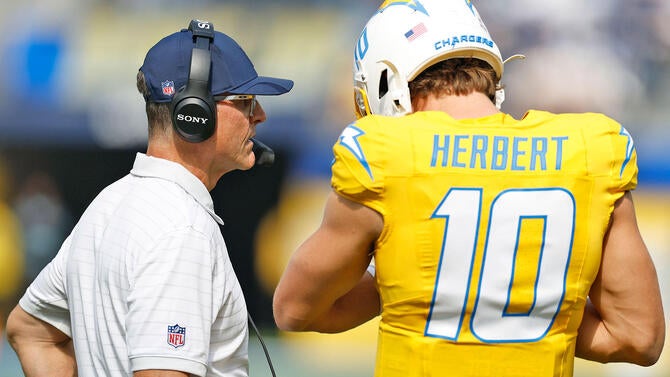 getty-jim-harbaugh-justin-herbert-chargers.jpg