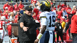 Biff Poggi emerges as realistic -- but risky -- option for Michigan as administration appears in flux