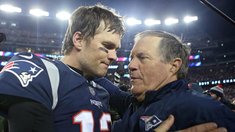 (012118 Foxboro, MA) New England Patriots quarterback Tom Brady hugs head coach Bill Belichick after winning the AFC Championship game at Gillette Stadium on Sunday, January 21, 2018. Staff Photo by Nancy Lane