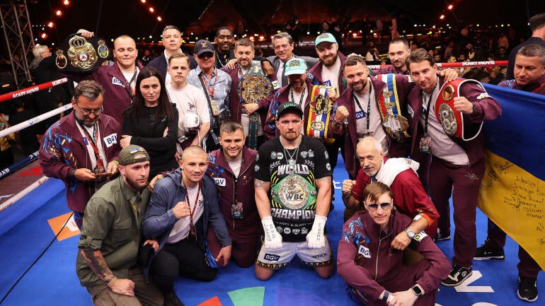 oleksandr-usyk-team-belts.jpg