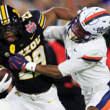 2025-12-28t023540z-657621607-mt1usatoday27891308-rtrmadp-3-missouri-tigers-running-back-ahmad-hardy-29-fends-off-1.jpg