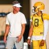 LSU Tigers head football coach Lane Kiffin talking with Quarterback Husan Longstreet 8 at LSU Football practice. August 18,
